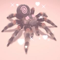 a large spider sitting on top of a pink surface with hearts around it's legs