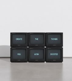 four small televisions with the words you, us, and instead written on them