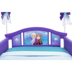 a bed with two frozen princesses on the headboard and one has a bow