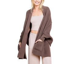 Stay cozy and warm with the Barefoot Dreams CozyChic blanket wrap. Featuring ribbed cuffs and front patch pockets, this wrap offers generous length for ease of movement while providing warmth without bulk. From Barefoot Dreams. Cozy Brown Outerwear With Ribbed Cuffs, Oversized Outerwear For Lounging In Fall, Oversized Outerwear For Fall Lounging, Snug Cozy Loungewear Outerwear, Cozy Snug Outerwear For Loungewear, Cozy Solid Color Cardigan For Loungewear, Comfortable Loungewear Outerwear With Ribbed Cuffs, Comfy Oversized Loungewear Outerwear, Comfy Oversized Outerwear For Lounging