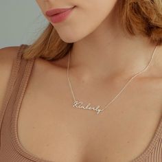 Discover the perfect accessory that reflects your unique style and personality with our Personalized Name Necklace. Handcrafted with care, each necklace features a custom engraved gold pendant, showcasing your chosen name. Whether it's a special gift for a loved one or a treat for yourself, our exquisite jewelry is designed to make a statement. Stand out from the crowd and express yourself with a one-of-a-kind piece that is as special as you are. Shop now and embrace the beauty of personalized jewelry ☆ Back to my store for more options: https://www.etsy.com/shop/aceelegance     ☆ All the pieces you purchased from AceElegance come with a Certificate of Authenticity(925 Sterling Silver, 8k Solid Gold, 14k Solid Gold, 18k Solid Gold) ☆ www.aceelegance.com ☆ ► 14k Gold Name Necklace * Feature Mother's Day Laser Engraved Necklace Gift, Christmas Custom Name Silver Necklace, Christmas Silver Custom Name Necklace, Handmade Nameplate Name Necklace For Personalized Gift, Handmade Nameplate Necklace As Personalized Gift, Personalized Silver Name Necklace For Christmas, Handmade Nameplate Necklace For Personalized Gift, Handmade Nameplate Necklace For Gift, Handmade Name Necklace For Personalized Gift