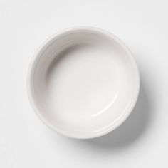 a white bowl sitting on top of a table