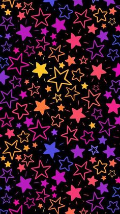 colorful stars are scattered on a black background