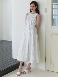 This is a minimal and unique dress by KINDABABY that is made out of high quality and sturdy fabric. With trendy design detail and feminine mood, you can style it for your daily casual outfit.- Balloon detail on the hem- Detachable long belt- Maxi length and sleeveless design Modern White Sleeveless Midi Dress, Modern White Midi Dress For Summer, Chic White Maxi Dress For Work, Modern White Cotton Dress, Modern White Summer Dress, Minimalist Spring Dresses For Daywear, Minimalist Spring Midi Dress For Daywear, Minimalist Midi Spring Dress, Modern White Midi Dress For Daywear