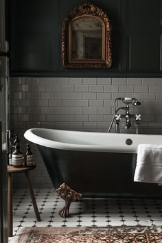 mody vintage bathroom, vintage bathroom, dark vintage bathroom, bathroom decor Bathroom Design Clawfoot Tub, Dark Bathroom Vintage, Dark Country Decor, Vintage Vogue Bathroom, Contemporary Victorian Bathroom, Moody Victorian Bathroom, Black And White Bathroom Aesthetic, Black Clawfoot Tub Bathroom