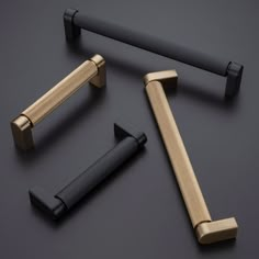 three different types of handles on a black surface