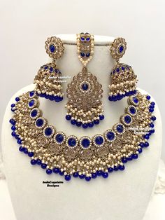 Antique Gold Polki Necklace Set comes with Jhumki earrings and tikka / Indian Jewelry/ High Quality Kundan and Polki Jewelry/ Bollywood Jewelry/Wedding/Royal blue  All items are shipped from Brampton, Ontario, Canada. If you need your item by a certain day, please reach out to us for express delivery option before placing the order so that we can update the shipping for you. Standard shipping/delivery timeline Below are the delivery timeline estimates once the order ia shipped ---> USA delivery Blue Temple Jewelry Bridal Necklace, Blue Temple Jewelry Bridal Necklace For Festivals, Blue Temple Jewelry Bridal Necklace For Celebration, Blue Bridal Temple Necklace For Celebrations, Blue Kundan Temple Jewelry Necklace For Festivals, Blue Temple Jewelry Chandbalis For Celebration, Blue Jewelry With Intricate Design For Festivals, Blue Chandbali Bridal Necklace For Wedding, Blue Latkans Jewelry For Wedding