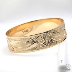 Bird of paradise gold bracelet Traditional Gold Jewelry With Engraving Option, Wide Band Yellow Gold Bracelets For Gift, Wide Band Yellow Gold Bracelets As Gift, Ceremonial Yellow Gold Jewelry With Engraving Option, Gold Jewelry With Engraved Thick Band, Gold Engraved Thick Band Jewelry, Etched Yellow Gold Bracelet, Engraved Yellow Gold Thick Band Jewelry, Traditional Jewelry With Engraving Option For Formal Occasions