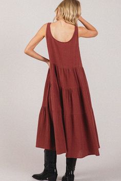 The Venice Maxi Dress - a versatile, stylish, and comfortable wardrobe staple. Made from lightweight gauze fabric, this tiered midi dress offers breathable elegance. Perfect for any occasion, from casual outings to special events. Casual Tiered Dress With Layered Hem, Casual Layered Hem Tiered Dress, Flowy Tiered Casual Midi Dress, Flowy Tiered Midi Dress Casual, Flowy Tiered Midi Dress Casual Style, Casual Flowy Midi Dress With Tiered Skirt, Casual Summer Tiered Dress With Layered Hem, Casual Tiered Summer Dress With Layered Hem, Casual Tiered Dress With Layered Hem For Day Out