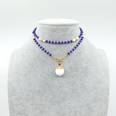 This Return to Origin multi-style beaded lapis necklace features 81 primary gemstones where every 9 gemstones are grouped and connected by spacer gemstones. Ancient Chinese people believe that the number 9 （九） means eternal, and if a person can survive 9*9 = 81 tribulations, he may be able to return to his original divine nature （九九歸真）. The beaded chain can also be styled as glasses chain. ⚜ Return to Origin Beaded Necklace ❀ 81 Natural Lapis 4mm❀ 16 Natural Tridacna 4mm❀ 8 Long Lasting Gold Pla Lapis Lazuli Crystal Necklace With Gemstone Beads, Elegant Lapis Lazuli Crystal Necklace With Gemstone Beads, Lapis Lazuli Gemstone Beads Crystal Necklace, Lapis Lazuli Necklace With Spacer Beads, Pearl Necklace With Lapis Lazuli Gemstone Beads, Elegant Round Beaded Lapis Lazuli Necklace, Lapis Lazuli Gemstone Beads Pearl Necklace, Luxury Lapis Lazuli Round Bead Necklaces, Chinese Meditation