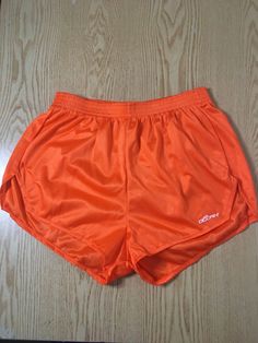 B86 New Womens and/or Men's Vintage Iconic Dolfin Shorts  No tags  Size Medium  Color orange  Elastic waistband  Stretchy soft and comfy  Makes a great Halloween 🎃 costume Cosplay etc Retro Stretch Sports Bottoms, Orange Sportswear Bottoms For Summer, Retro Stretch Bottoms For Sports, Fitted Casual Bottoms For Sports Events, Casual Fitted Bottoms For Sports Events, Casual Orange Athletic Shorts For Training, Short Sports Bottoms With Pockets, Sporty Orange Bottoms For Running, Sporty Orange Bottoms For Training