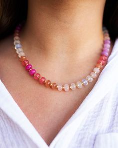 Introducing our breathtaking "Blushed" gemstone necklace--a piece that beautifully harmonizes soft, muted pinks with vibrant pops of colorful gemstones.  Each gemstone is separated by dainty 3mm gold-filled beads, adding a touch of elegance to this stunning piece. Perfect for elevating any outfit, this necklace is a must-have for your jewelry collection!   *Gemstones: Jade & Quartz  *Bead size - 6,8mm Rondelle *Mechanism - Gold Filled Lobster Clasp with option of added 3" gold filled chain extender. Pink Spiritual Necklace With Faceted Beads, Adjustable Pink Gemstone Beads Necklace, Adjustable Pink Necklace With Gemstone Beads, Adjustable Pink Gemstone Beaded Necklace, Adjustable Pink Gemstone Beaded Necklaces, Pink Crystal Necklace With Natural Stones, Pink Faceted Beads Necklace For Healing, Pink Healing Faceted Bead Necklaces, Healing Pink Faceted Bead Necklaces