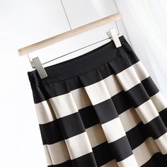 Discover Sophistication and Style Step into the season with confidence and grace with our Elegant Striped Mid-Calf Pleated Skirt. Perfectly tailored for the discerning woman who dresses to impress, this skirt combines classic stripes with a modern silhouette to elevate your wardrobe essentials. Crafted from high-quality polyester and designed with a blend of style and comfort, it's your ideal companion for both office and leisure. Product Features Material: Premium polyester for durability and e Cardigan Sweater Vest, Crop Top Shirts, Office Lady, Ladies Tops Fashion, Office Ladies, Fashion Tops, Empire Waist, Skirt Length, Mid Calf