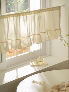 a white table and window in a room