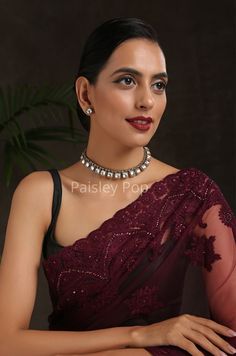 The Polki choker necklace is inspired by the rich Indian jewelry-making techniques handcrafted by the artisans to celebrate perfect armor between ancient and modern concepts. The gold plated western necklace can be paired with your Indo western dresses gracefully. Pair this gorgeous replica of Bollywood jewelry with your ethnic or contemporary ensembles and create a look to remember. Necklace Closure - Adjustable Dhori. Style Tip - The tasteful design will keep you hooked every time you look at Elegant Festive Choker, Traditional Kundan Choker Necklace For Formal Events, Luxury Kundan Necklace For Festive Party, Luxury Kundan Necklace For Party And Festive Occasions, Traditional Festive Choker For Formal Occasions, Elegant Choker For Formal Festivals, Formal Traditional Choker, Traditional Festive Formal Choker, Formal Festive Traditional Choker