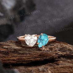 two heart shaped turquoise and white stone rings