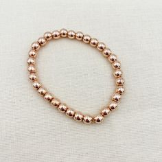 Choose 6mm, 8mm, or 10mm rose gold plated hematite beads
 	Made in Texas
 	Wrapped in our signature box
 	Please allow 5 business days for us to process Rose Gold Beaded Bracelet, Gold Bead Bracelet, Rose Gold Beads, Gold Bead Bracelets, Hematite Beads, Brilliant Colors, How To Make Beads, Bead Bracelet, Rose Gold Plates