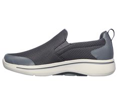 A classic walking style gets even more supportive comfort in the Skechers GO WALK Arch Fit - Togpath shoe. This pull-on sneaker features an athletic engineered mesh upper with removable Arch Fit insole and a lightweight ULTRA GO cushioned midsole. | Skechers Men's GOwalk Arch Fit - Togpath Slip-On Shoes Functional Low-top Slip-on Sneakers For Walking, Athleisure Sneakers For Walking With Arch Support, Ortholite Slip-on Walking Shoes For Sports, Slip-on Ortholite Insole Walking Shoes For Sports, Athleisure Walking Shoes With Branded Insole, Slip-on Walking Shoes With Ortholite Insole For Sports, Comfortable Walking Shoes With Removable Insole For Jogging, Functional Slip-on Walking Sneakers, Athleisure Walking Shoes With Ortholite Insole