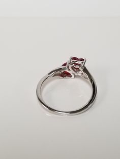 "Thanks for shopping our vintage estate store. We tend to sell well below wholesale and truly hope you enjoy all of our items. Many of the items are one of a kind, so please enjoy scrolling through the pictures and hopefully something will catch your eye. Black spots are from camera. Nice estate sterling silver 925 .50ct garnet heart with cz diamonds ring. This is a custom made ring from our shop, meaning we set the gems into the setting. Ring Size: please select a size Setting: 3/8\" 10mm Weigh Vs Clarity Diamond Ring For Valentine's Day Formal, Classic Heart-shaped Ruby Promise Ring, Classic Heart-shaped Ruby Ring For Formal Occasions, Heart Cut Ruby Ring With Prong Setting For Anniversary, Anniversary Ruby Ring With Heart Cut And Prong Setting, Anniversary Ruby Ring With Vs Clarity, Anniversary Ruby Ring With Vs Clarity And Round Cut, Anniversary Hallmarked Ruby Ring With Cubic Zirconia, Anniversary Hallmarked Cubic Zirconia Ruby Ring