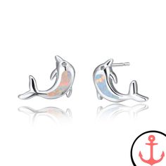 Dolphin Earrings Studs: Embrace the Mystical Charm of the Sea Indulge in the enchanting allure of the ocean with our Dolphin Earrings Studs. Lovingly crafted to capture the spirit of the sea, these exquisite earrings are the perfect accessory for passionate lovers of marine life. Whether you're a devoted sea explorer or simply drawn to the majestic beauty of dolphins, these studs are a must-have addition to your jewelry collection. Designed with a careful blend of opal and stainless steel, these Cute Dolphin, White Opal Earrings, Dolphin Earrings, Fire And Stone, Quirky Earrings, Stone Studs, Faux Stone, Opal Earrings, Earrings Blue