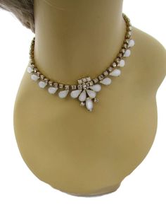 Gorgeous vintage Joseph Warner Bridal Necklace. Large white moonstones or faux opals and Austrian crystals made to resemble a crown jewel necklace. Absolutely Perfect for a wedding or any formal event. Signed Joseph Warner in caps and was made by the Joseph Warner company. Warner only produced jewelry from the 1950s until the 1970s. Vintage jewelry will ship in a gift box. Excellent condition no missing rhinestones or discolored or darkened stones and the metal still shines and will continue to White Crystal Rhinestone Jeweled Necklace, White Adjustable Rhinestone Necklace For Party, Adjustable White Rhinestone Necklace For Party, White Rhinestone Necklace For Party Costume Jewelry, White Crystal Necklace With Rhinestones, White Rhinestone Jeweled Necklace For Party, Elegant White Adjustable Rhinestone Necklace, Formal White Jeweled Jewelry, White Crystal Jewelry With Stones