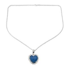 Shanker designs a necklace of romantic elegance that is crafted by hand of sterling silver. The necklace glows with the enhanced blue beauty of chalcedony believed to harmonize mind body and spirit. .925 Sterling silver Elegant Blue Heart Necklace, Elegant Blue Necklace With Heart Charm, Elegant Blue Necklaces With Heart Charm, Elegant Blue Necklaces For Valentine's Day, Formal Sapphire Heart Necklace, Elegant Sapphire Heart Pendant Necklace, Elegant Sapphire Necklaces For Valentine's Day, Elegant Blue Heart Necklace For Valentine's Day, Blue Heart Pendant Necklace For Formal Occasions