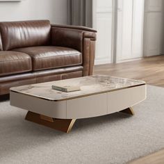 a living room with a couch, chair and coffee table on carpeted flooring