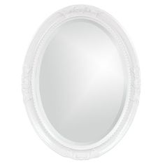 a white oval mirror on a white wall