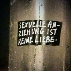 a sticker on the side of a building that says sexile an - zein ung ist keine liebe