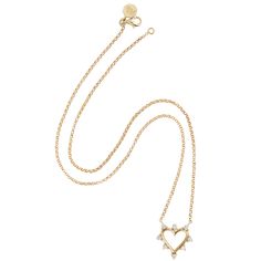 Handcrafted in Manhattan from the highest quality materials, Marlo Laz jewels are modern heirlooms and precious talismans. The Mini Open Heart Necklace is a constant reminder to face the day with an open mind. Hand-cast in 14K gold and adorned with white diamonds, this accessory is a special gift for yourself or someone you hold dear. Product Details 14K yellow gold with white diamonds. Made in Manhattan. Care Instructions Spot clean. Size & Fit 0.5" L Shipping Details Please allow 3 weeks for s Timeless Necklace With Rose Cut Diamonds For Gift, Timeless Necklace With Rose Cut Diamonds As Gift, Timeless Rose Cut Diamond Necklace For Gift, Timeless Rose Cut Diamond Necklace As Gift, Timeless Rose Cut Diamond Necklace Gift, Gift Jewelry With Diamond White Rose Cut Diamonds, Gift Jewelry With Rose Cut Diamonds In Diamond White, Timeless Single Cut Diamond Jewelry Gift, Heirloom White Gold Necklace With Single Cut Diamonds