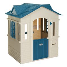 a toy house with a blue door and windows