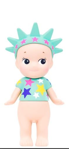 a small toy doll with stars on it's head