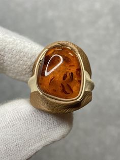 Natural Baltic Amber Adjustable Ring Cognac Color With Leather Baltic Amber Ring, Elegant Brown Leather Jewelry, Luxury Brown Formal Rings, Formal Handmade Leather Jewelry, Modern Brown Jewelry For Anniversary, Modern Brown Rings For Formal Occasions, Modern Brown Ring For Formal Occasions, Modern Brown Rings For Anniversary, Modern Formal Brown Ring