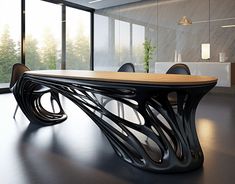 a large table with chairs around it in an office space that looks out onto the outdoors