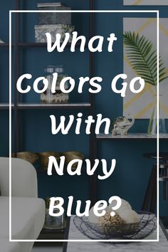 a living room with blue walls and white furniture, the words what colors go with navy blue