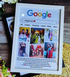 a photo frame sitting on top of a wooden table next to flowers and an ipod