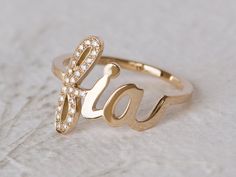 This is a unique solid gold personalized name ring, the perfect 14K/18K name ring, a stunning personalized push gift, customized name ring, diamond name ring. Fabulous 14K Gold personalized name ring, customized with your name or any word with sparkling diamonds set on the initial. This unique ring has your initial studded with multiple diamonds. Rest of the letters of your name appear in shiny script in polished gold, this unique piece makes a wonderful push present or gift for any mom, sister, Elegant 14k Gold Customizable Engraved Ring, Elegant Customizable 14k Gold Engraved Ring, Customizable Yellow Gold Initial Ring For Wedding, Luxury Personalized White Gold Diamond Ring, Elegant Customizable Initial Ring For Promise, Elegant Named Jewelry For Promise, Elegant Customizable Initial Promise Ring, Personalized Luxury Yellow Gold Initial Ring, Personalized Luxury Rose Gold Initial Ring