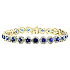 This gorgeous bracelet features 26 round brilliant blue sapphires weighing 7.47 carats total. Each stone is surrounded by a single row of small round 338 diamonds weighing 2.31 carats total. Set in 14k yellow gold. Style available in different price ranges. Prices are based on your selection. Please contact us for more information. Bracelet Tennis, Gorgeous Bracelet, Tennis Bracelet, Round Brilliant, Halo Diamond, Sapphire Ring, Blue Sapphire, Halo, Sapphire