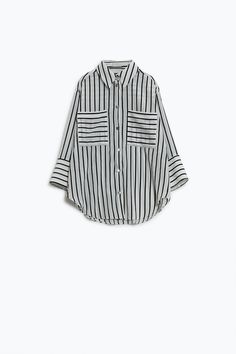 Elevate your wardrobe with our White Shirt with Black Stripes and Chest Pockets. This classic shirt features a timeless stripe design that adds a touch of sophistication to your look. Crafted from a blend of 60% polyester and 40% viscose, this shirt is soft, comfortable, and perfect for all-day wear. The relaxed fit ensures a flattering silhouette, while the chest pockets and button detail add a touch of elegance. Model is wearing size U. Pair this shirt with jeans for a casual look or dress it up with trousers for a more polished ensemble. Whether you're heading to the office or out for brunch, this shirt is sure to become a staple in your wardrobe. Shop now at Szua Store and add the White Shirt with Black Stripes and Chest Pockets to your collection!