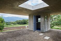 a concrete structure with a skylight above it