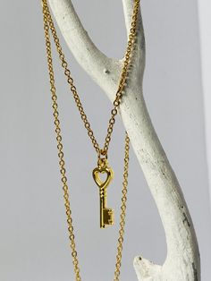 Unlock the key to their heart with our 18k gold plated Heart Key Charm. Featuring a stunning heart-shaped pendant, this charm is sure to make a lasting impression. The 16" non-tarnish stainless steel chain ensures durability and effortless style. Perfect for gifting and everyday wear. Heart Key, Heart And Key, Steel Chain, Stainless Steel Chain, Heart Charm, Charm Jewelry, Effortless Style, Beaded Jewelry, 18k Gold