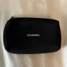 Black Chanel Cosmetic Pouch 100% Authentic This Pouch Was Part Of A Gift Set Sold On The Chanel Site. Pouch Is New And Unused. No Original Box Is Available. Designer Black Clutch With Rectangular Case, Designer Black Clutch In Rectangular Case, Designer Black Rectangular Clutch, Elegant Portable Black Pouch, Elegant Black Travel-friendly Pouch, Black Zipper Pouch Bag, Designer Black Bag With Rectangular Case, Designer Black Bags With Rectangular Case, Designer Black Rectangular Case Bag