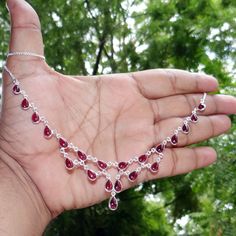 "Natural Cabochon Garnet 925 Sterling Silver Bezel Set Handmade Wedding Necklace. J70405  Main Color: Red  Size: Non Adjustable (18\" inch) Stone Size (can vary as per availability) : 5x8 Pear Weight:  12 gram  Item code: J70405  You can use it your self or Gift it to someone. It is an ideal gift which everyone would love to get. If you want extra small or extra large let me know. We will make it specially for you. Brought to you exclusively by Jewellery4All" Sterling Silver Necklaces With Stones For Wedding, Sterling Silver Gemstone Bridal Necklace For Anniversary, Silver Gemstone Bridal Necklace For Anniversary, Hand-set Ruby Necklaces In Silver, Sterling Silver Necklaces With Stone Setting For Wedding, Silver Bridal Necklace With Stones For Anniversary, Silver Gemstone Drop Necklace For Anniversary, Silver Drop Necklace With Hand Set Details, Silver Teardrop Necklace With Hand-set Details