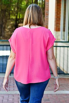 Who doesn't love a pop of color?! Experience effortless style and comfort with our Casual Dolman Sleeve Top in Hot Pink. Made with dolman sleeves and a round neckline, this top is perfect for any casual occasion. Enjoy the beautiful color and non-sheer fabric, making it an essential addition to your wardrobe. ABOUT THIS ITEM: Made in Vietnam. Fabric is 100% Polyester. Hand wash in cold water. Hang or line dry. The Model is 5'9, and wearing a medium. Dolman Sleeve Top, Maxi Tops, Dolman Sleeve Tops, Fabric Making, Jumpsuit Shorts Rompers, Loungewear Sets, Sleeveless Sweater, Sheer Fabric, Tunic Sweater