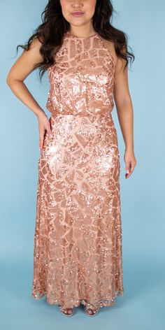 td {border: 1px solid #ccc;}br {mso-data-placement:same-cell;} Beautiful sequined gown featuring a halter neck. Perfect for a maid of honor or some sparkle in your bridal party. Brand: Donna Morgan Retail Price: $290 Color: Rose Gold Interior: Nylon; Exterior: Polyester Fully Lined Model Info: Height: 5'2 Waist: 26'' Wearing a size 2 *Style Notes: This dress runs small. Sleeveless Wedding Gown With Contrast Sequin, Sleeveless Gown With Contrast Sequin For Wedding, Sequin Halter Neck Party Gown, Halter Neck Sequin Party Gown, Fitted Halter Neck Sequin Wedding Dress, Fitted Halter Neck Sequin Dress For Wedding, Glamorous Sleeveless Sequin Wedding Fabric, Glamorous Sleeveless Sequin Wedding Dress, Sleeveless Sequin Dress For Wedding With Contrast Sequin