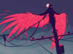 a person standing on top of a power pole with an angel wings painted on it