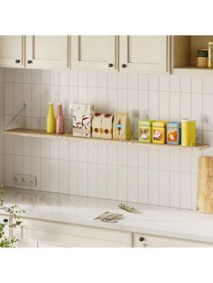 the kitchen counter is clean and ready to be used as a shelf for soaps