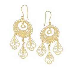 Possessing the elegance of a princess these chandelier earrings are designed by Balinese artisan Desi Antari. Handcrafted sterling silver wire and dot patterns are bathed in 18k gold with three sections that dangle below.