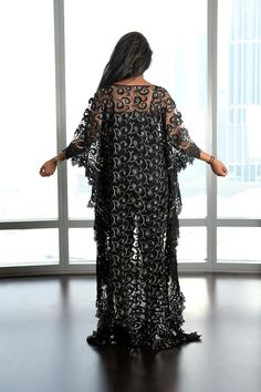 black sheer kaftan dress Evening Lace Long Maxi Dress, Black V-neck Maxi Dress For Eid, Evening Long Lace Maxi Dress, Long Maxi Dress With Sheer Sleeves For Evening, Luxury Festive Maxi Dress, Elegant Long Evening Kaftan, Black Sheer Floor-length Dress, Gold Bohemian Kaftan For Party, Elegant Evening Long Kaftan