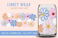 a glass jar with flowers on it next to a pink background and text that reads liberty wrap